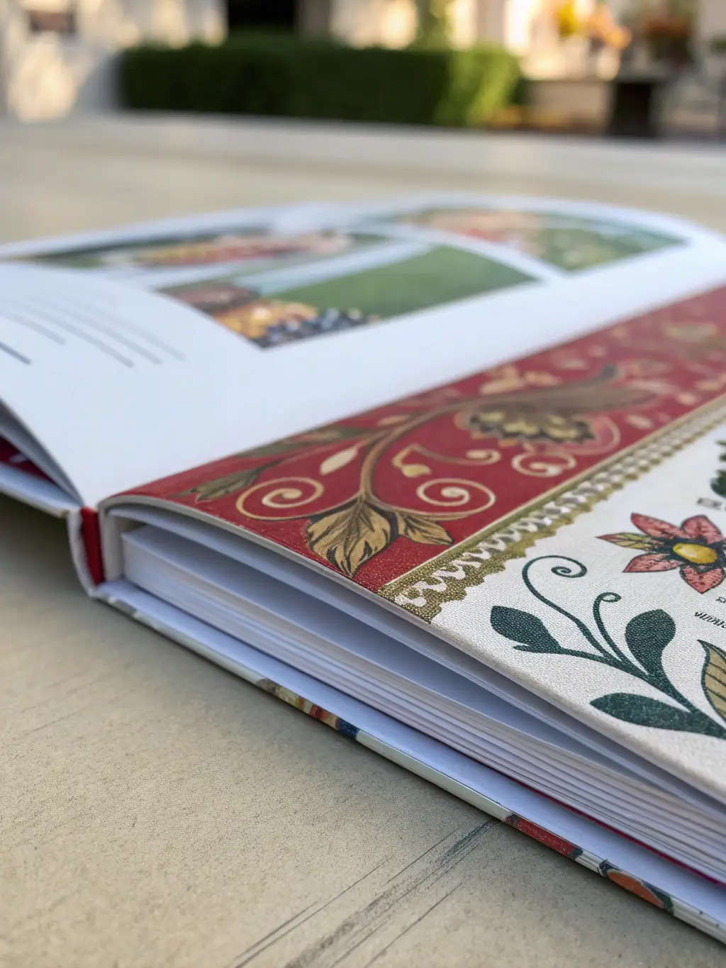 A visually appealing image of a printed catalog featuring Gilbert Ganteaume's artwork, with a close-up shot of a vibrant painting on the cover. The catalog should look professional and informative.